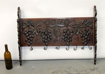 French carved walnut hat rack with grapes. French carved walnut hat rack with relief carved 