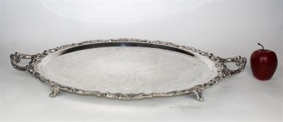 Large oval silver plate double handled tray. 2 1/4"h x 28 5/8"l x 18"w
