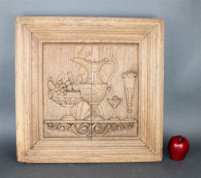 French relief carved oak panel with still life with urns and fruit. Early 20th century, 21"square.
