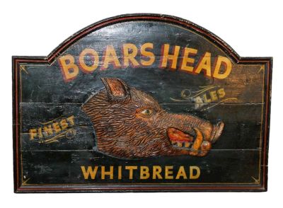 Carved wooden Boars Head Whitbread pub sign. Carved and painted wood Boars Head Whitbread pub 