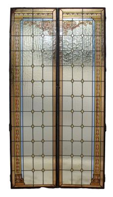 Pair of antique stained, painted & leaded glass windows in iron frames. Pair of antique stained 