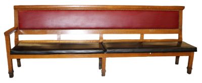Antique oak train bench with Right side arm. Vinyl seat and back. Early 20th century. 42 1/2"h 