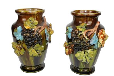 Pair of French Barbotine Majolica urns with grape motif. Signed on the base illegibly. Early 