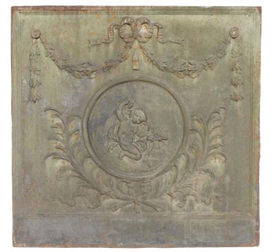 Antique French cast iron fireback with cherub. 19th century. 34 1/2"h x 35 1/4"w
