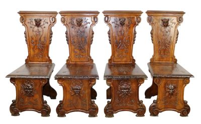 Set of 4 Italian Renaissance hall chairs in carved walnut. Set of 4 Italian Renaissance hall 