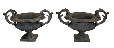 Pair classical antique cast iron urns. Pair classical antique cast iron double handled urns. 16 
