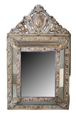 Antique Dutch repousse brass cushion mirror. 19th century. 21 3/8"h x 12 5/8"w x 3"d