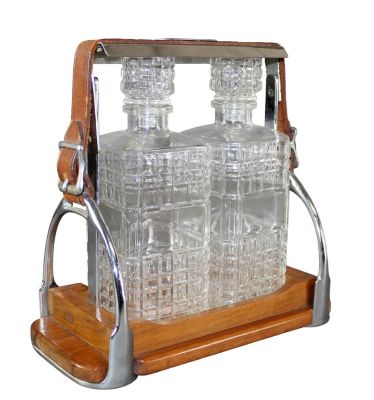 Equestrian tantalus set with leather stirrup straps. Equestrian tantalus with leather stirrup 