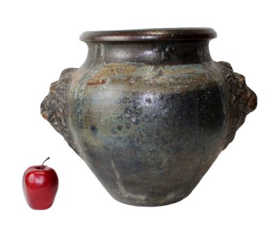 French ceramic planter with lion heads. Mid 20th century. Drainage hole in the bottom. 14 1/2"h 