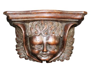 French carved oak wall shelf with cherub. Late 19th century. 5 3/4"h x 9 1/2"w x 4 1/2"d