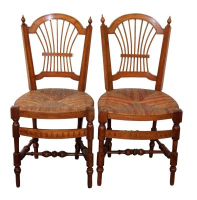 Pair of French wheat back rush seat chairs. Pair of French wheat back rush seat side chairs in 