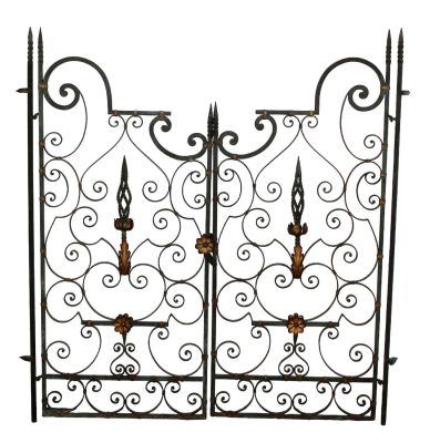 Pair of French scrolled wrought iron garden gates. Mid 20th century. Each panel measures 54 
