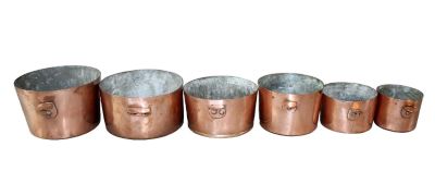Lot of 6 French copper pots with double handles. Maker's marks. Early 20th century. Ranging in 