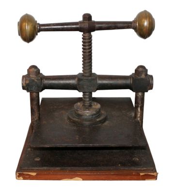 Antique French cast iron book press. French cast iron book press. On slim wood base. Early 20th 