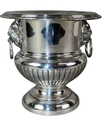 Silverplate champagne bucket with lions heads. Silverplate champagne bucket with double handles 