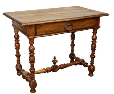 French bureau plat desk on turned legs in walnut. Single drawer. Cross stretcher with finial. 