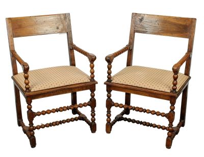 Pair of French walnut farmhouse arm chairs. Pair of French farmhouse armchairs in walnut with 