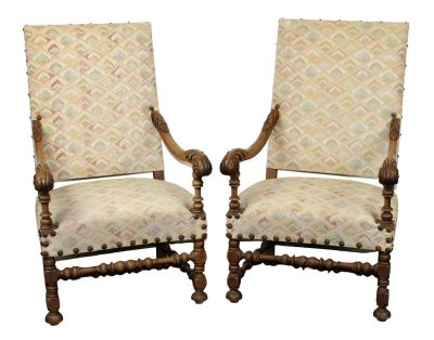Pair of French Louis XIV style upholstered fauteuil armchairs in walnut. Early 20th century. 
