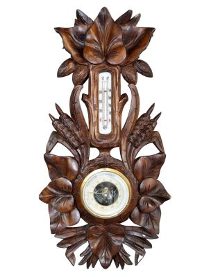 French carved walnut barometer with lily pads and cat tails. French carved walnut wall mount 