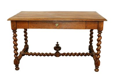French bureau plat desk in oak with barley twist legs and stretcher with finial. SIngle drawer 