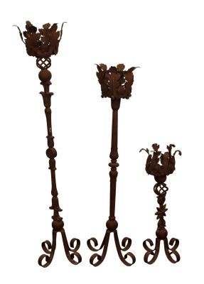 Set of 3 wrought iron candle torchieres. 25"h, 41 1/2"h, 49 3/4"h
