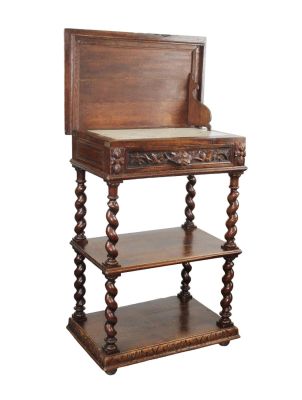 French carved oak tiered lift top server with barley twist. Top lifts to show a marble top 