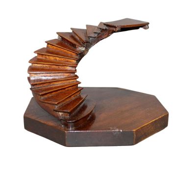 Miniature mahogany spiral staircase model 6" h x 8 1/2" sq. Condition: Old repair to the 