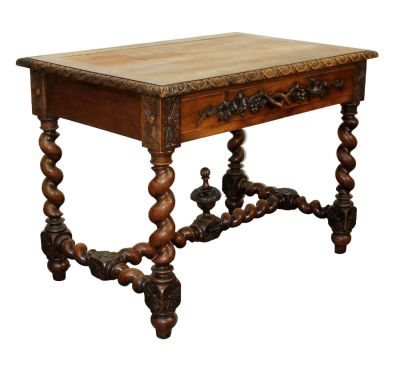 French Louis XIII bureau plat desk in walnut with relief carved grape vine motif. 19th century. 
