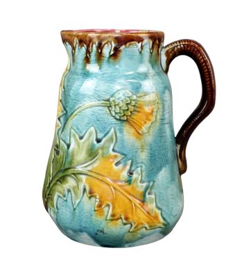French Majolica Thistle pitcher. Early 20th century. 8 1/2" h x 7" w x 6" diam Condition: Old 