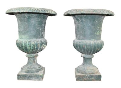 Pair of French cast iron classical urn form vases. Early 20th century. 13 3/4" h x 10" diam