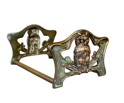 French Art Nouveau book rest with owls. French Art Nouveau polychrome metal book rest with owls. 