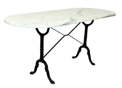 French oval cafe table on iron base with marble top. French cafe table on cast iron base with 