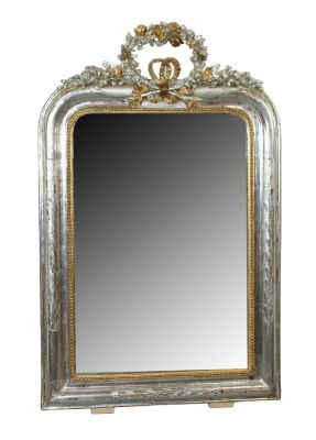 French Louis Philippe silver and gold leaf mirror with floral wreath crest. French Louis 