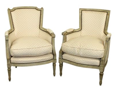 Companion pair of French Louis XVI style bergere chairs. Early 20th century. 36"h x 25 3/4"w x 