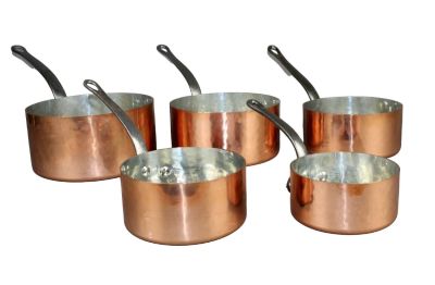 Set of 5 French hammered copper pots with iron handles. Mid 20th century. 7 1/2" h (overall) 4" 