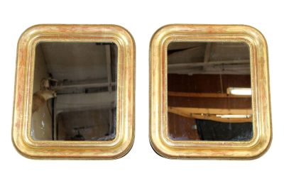 Pair of petit French Louis Philippe gold leaf mirrors. Pair of petite French Louis Philippe gold 