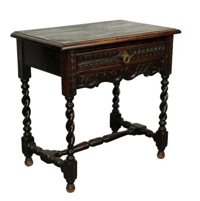 English Jacobean waxed oak side table with drawer. On twist legs. Paper label on underside 