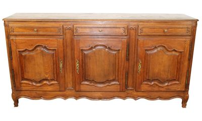 French Provincial 3 door sideboard in oak. Early 20th century. 39 1/4"h x 78 1/2"w x 19 1/8"d