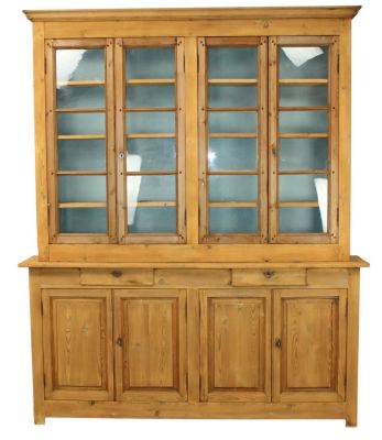 French 4-door farmhouse bookcase in pine. Late 19th century. 97" h x 80 1/4" w x 13 3/4" d