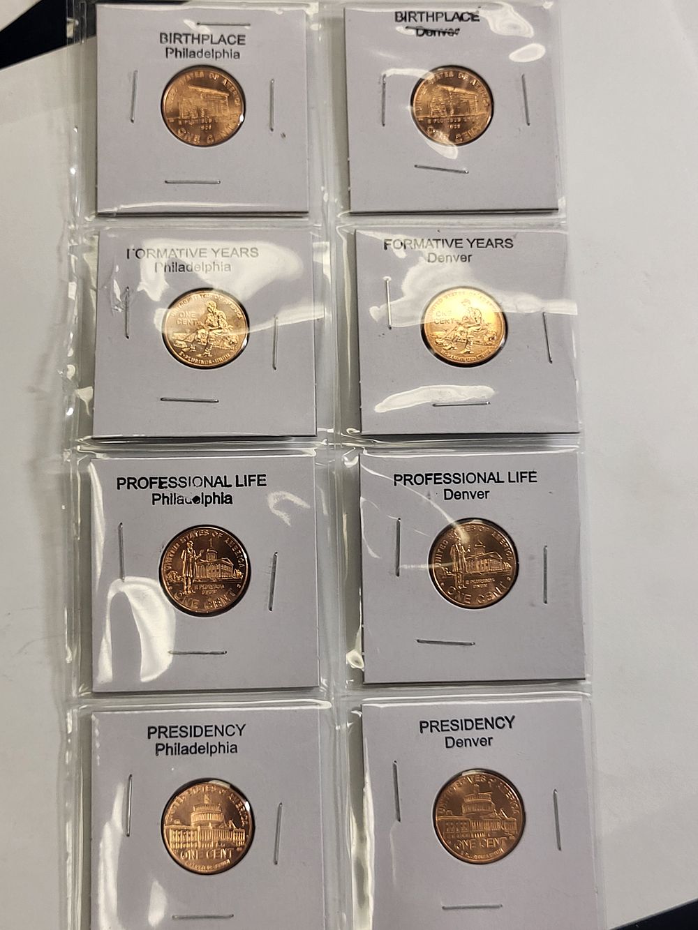 8 coins lincoln cent 2009 100th anniversary pennies. these are all red BU! great collectibles a 