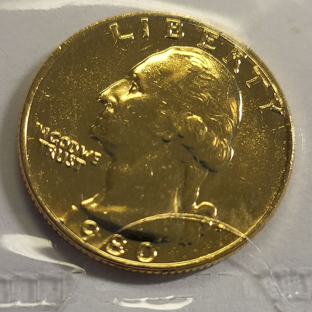 1980 us quarter gold plated bu-au. check out the pics