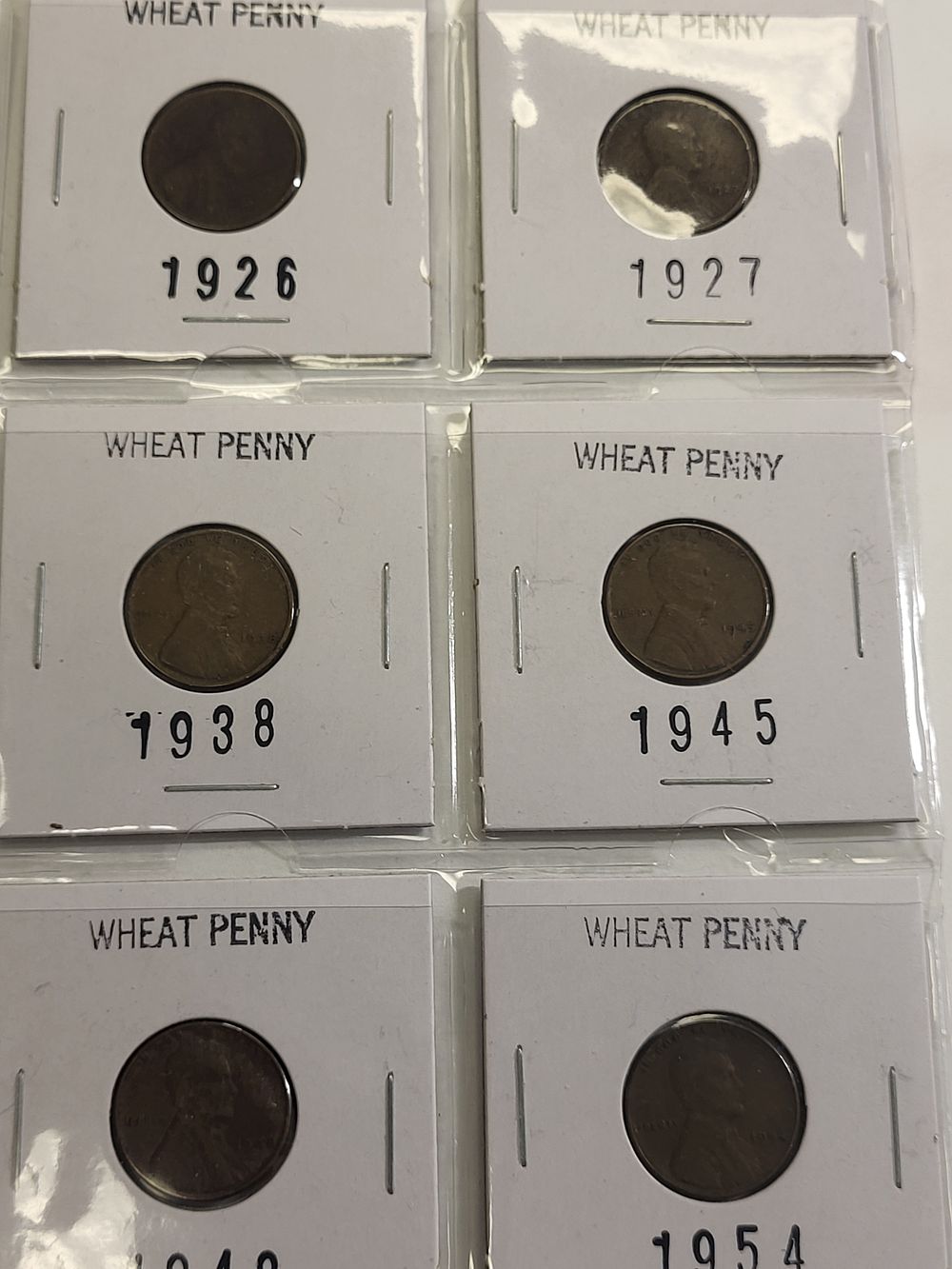 lot of 6 lincoln wheat cent pennies us coin. 1926, 27, 38, 45, 48. 54 all 6 forone bid see pics