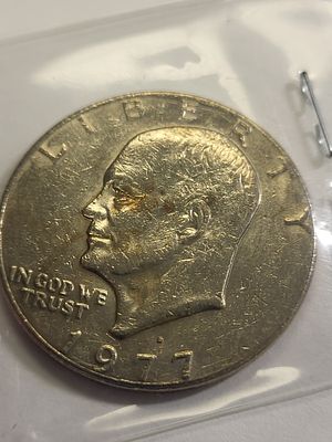 1977 ike dollar error? filled D us coin. check out the pics you decide