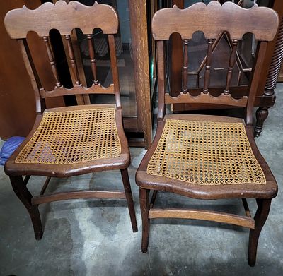 antique walnut Eastlake pair of chairs w/cane bottom. very nice 32" tall at back 17" x 17" both 