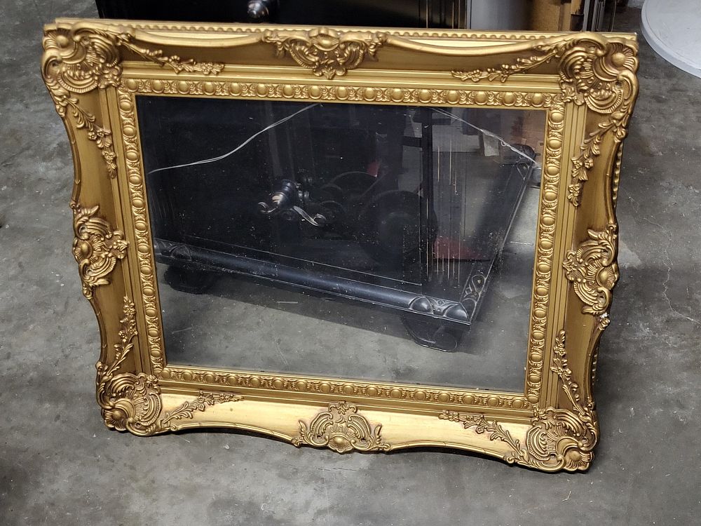 vtg baroque style picture frame gold gilded w/glass. 29" x 24" outer frame and 20" x 16" inside 