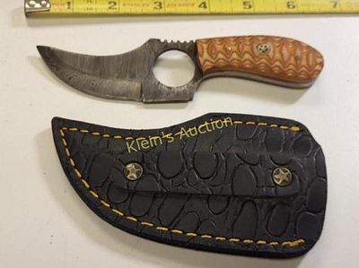 steel hunting & skinning knife w/sheath. sheath has spot to keep on belt see pics excellent!