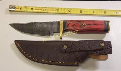 damascus steel hunting knife w/sheath. 8" knife with hand tooled sheath too! see pics