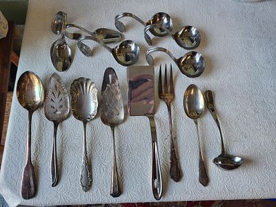 large lot of silver plate utensil & serving spoons ladles . large lot of silver plate utensil 