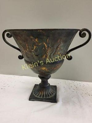 Distressed Metal Urn Planter in a distressed finih. Distressed Metal Urn Planter in a distressed 