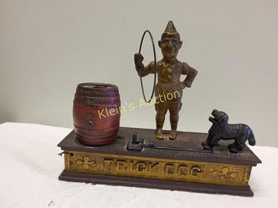 hubley cast iron trick dog mechanical bank works. 1888,pat'd , put coin in dogs mouth, push 